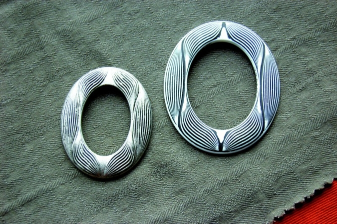 Even belt rings are a source of artistic handwork in miniature, as seen at Knopf & Knopf