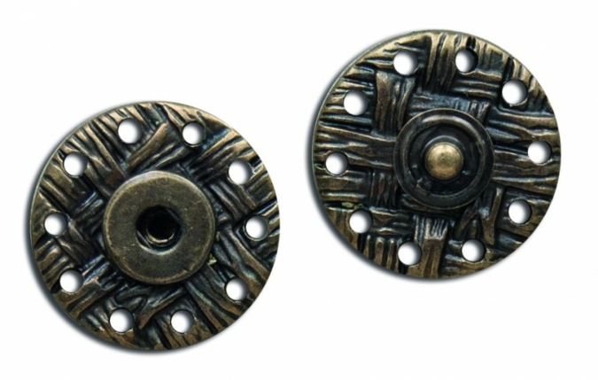 Aged look and wooden textures find their way onto metallic fasteners at Knopf & Knopf Photo: Knopf & Knopf