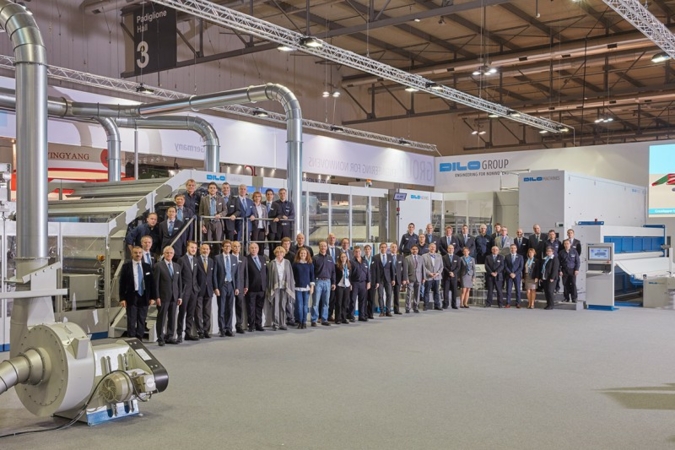 DILO staff at ITMA 2015: Technicians, technologists and the complete sales staff worked together to present the advantages and the  high-capacity o...