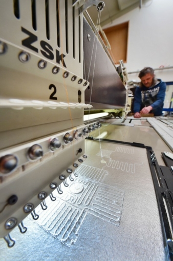 Sticktechnisch erzeugte Heizelemente Photos: W. Reuter & Sohn Spitzen und Stickereien